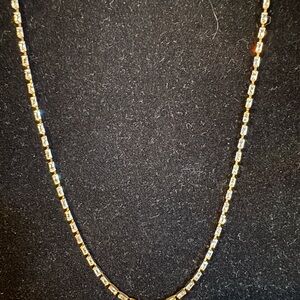 Elegant Gold and Silver Necklace